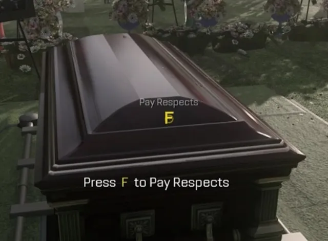 view of the coffin and the prompt on PC saying to press F to pay respects