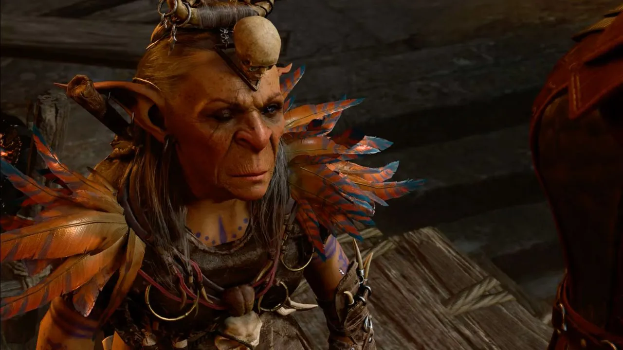 Woman wearing feathers and skulls in the goblin camp in BG3
