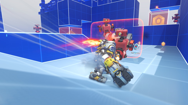 Reinhardt holds up his shield against a training bot in Overwatch 2's Hero Mastery mode.