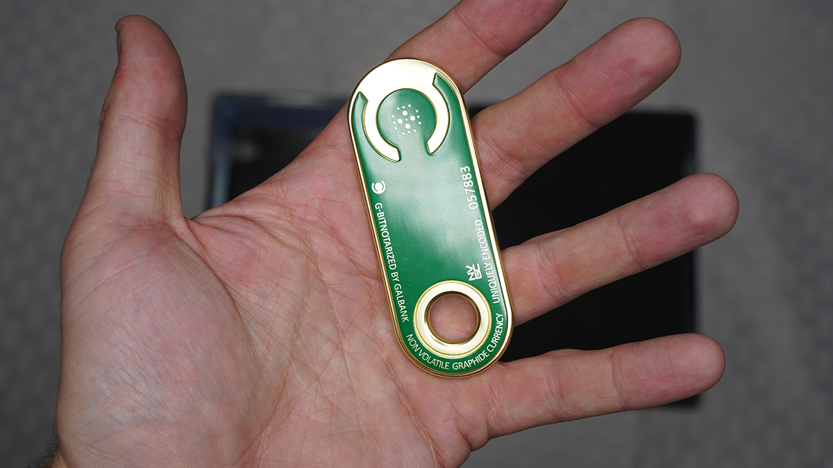 A reproduction of the Credstick, a small green object from Starfield. 