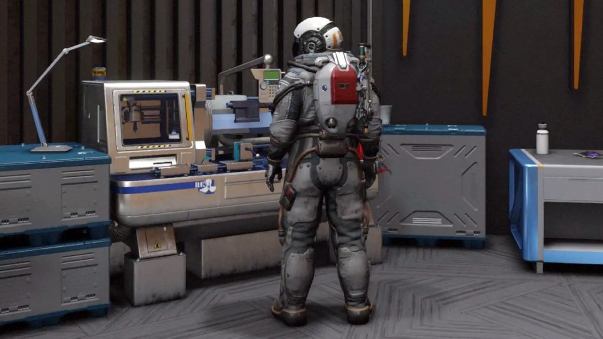 Starfield player standing at weapon workbench