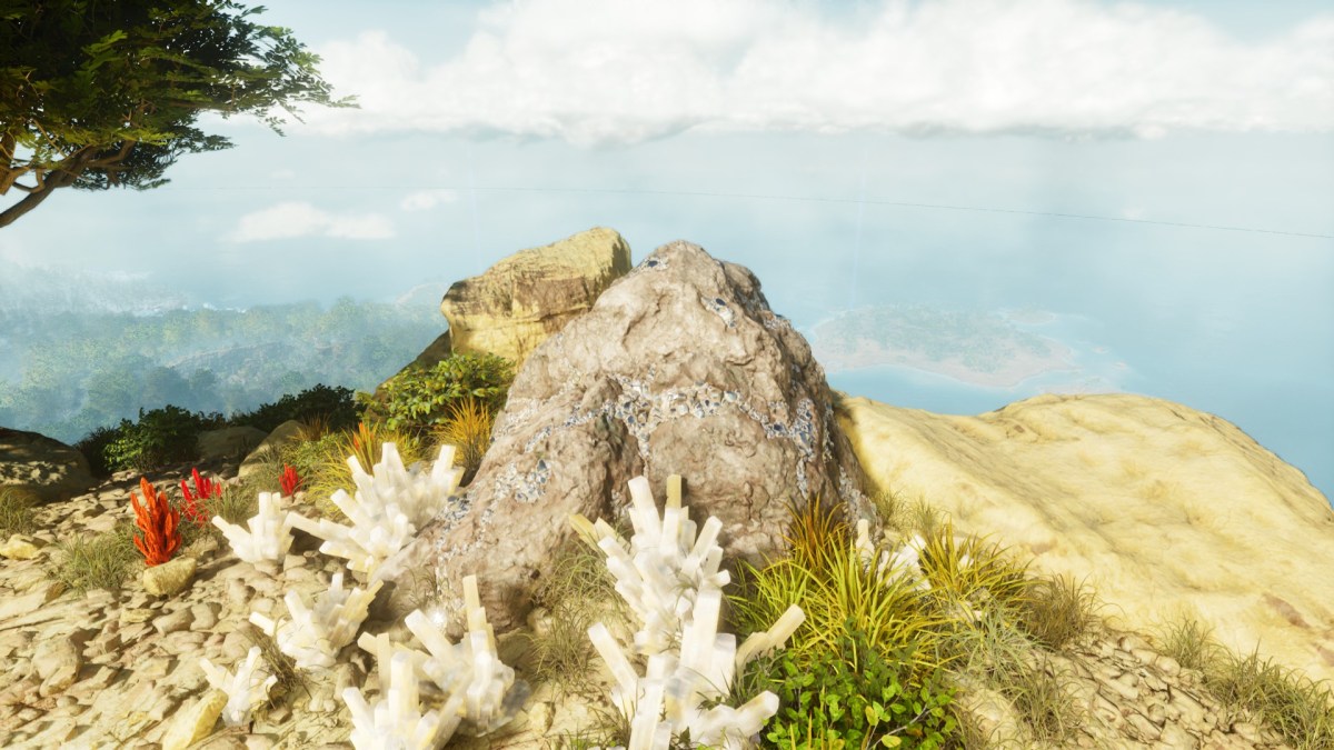 A rock with metal on top of a mountain in Ark: Survival Ascended.