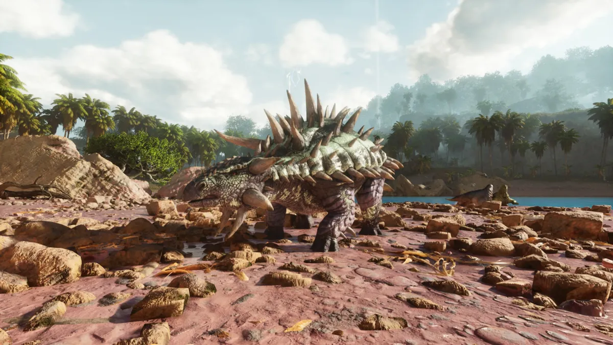 An Ankylosaurus walking over rocks in Ark: Survival Ascended.