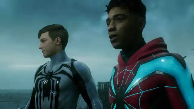 Spider-Man 2 Peter Parker and Miles Morales standing on top of a building