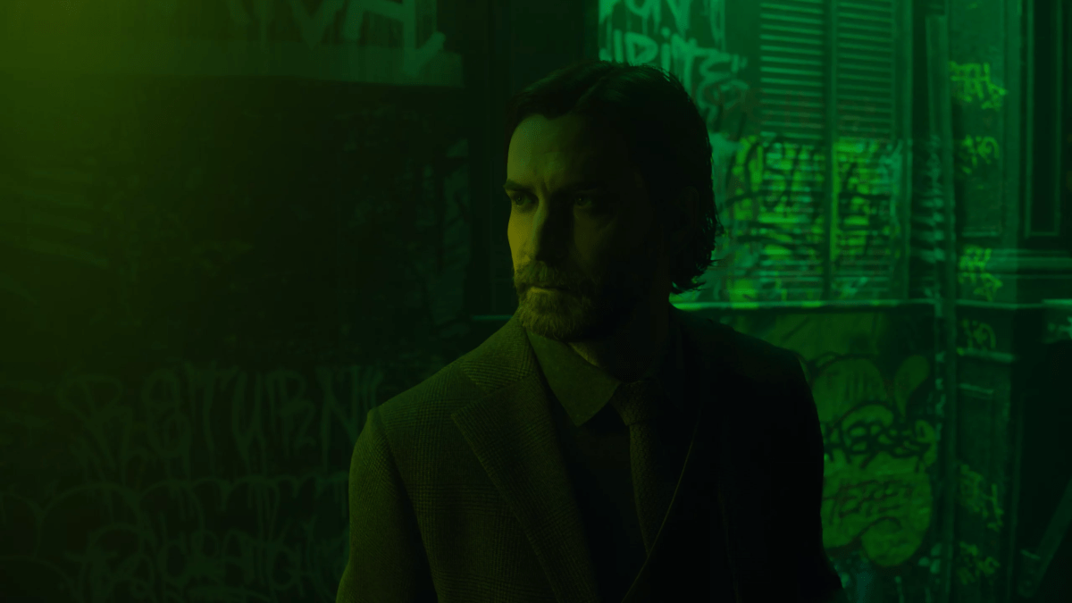 A close up of Alan Wake in green tones.