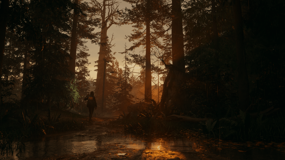 Saga walks through the woods in Alan Wake 2