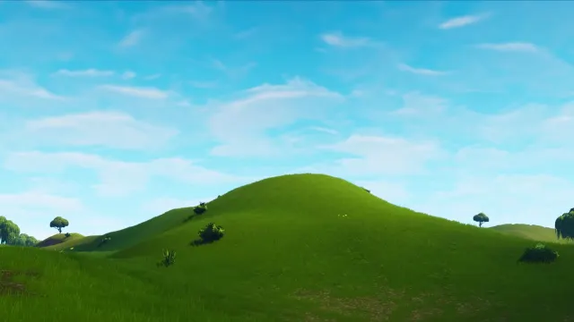 A hill sitting beneath the original sky from Fortnite Chapter One, season five.