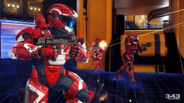 Three red team Spartans run forward, shooting the SMG and Magnum.