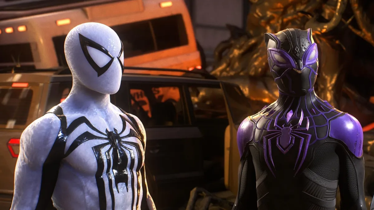 Peter Parker in the Anti-Venom suit stands alongside Miles Morales in the Forever Suit in Spider-Man 2.