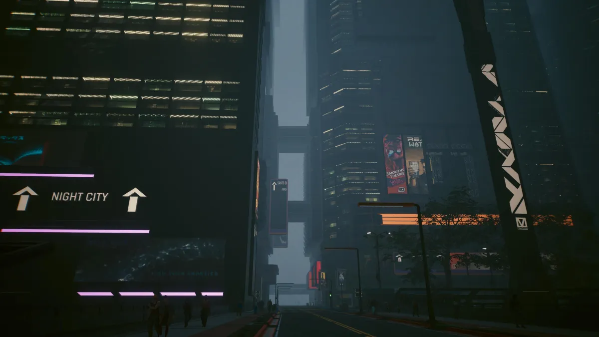 An in game screenshot of Night City from the game Cyberpunk 2077.