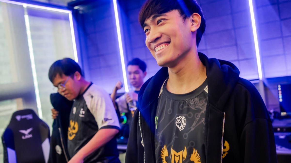 GAM Esports' Levi smiling after winning a game at Worlds 2023 Play-In stage.