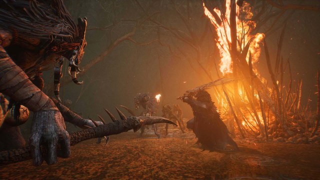 Monsters in Lords of the Fallen's Fen area surrounding the player character, who wields a greatsword.