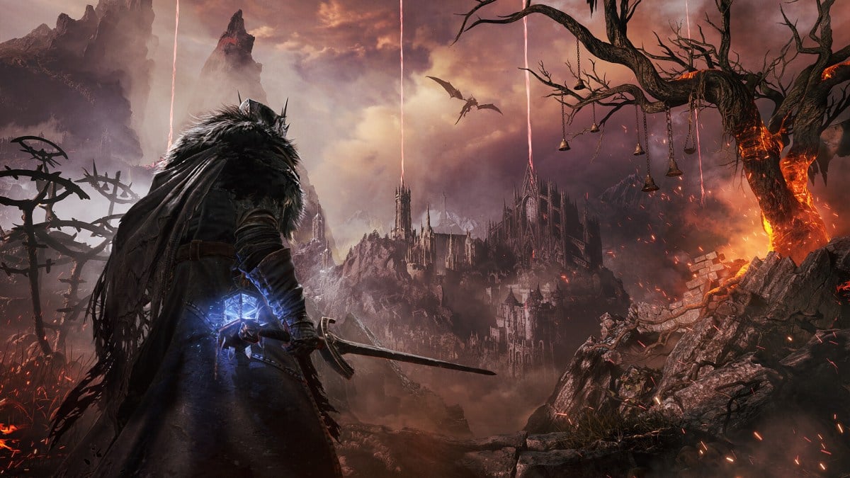 A hero overlooking a castle in Lords of the Fallen.