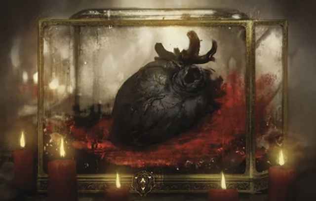 Black heart contained in glass chest
