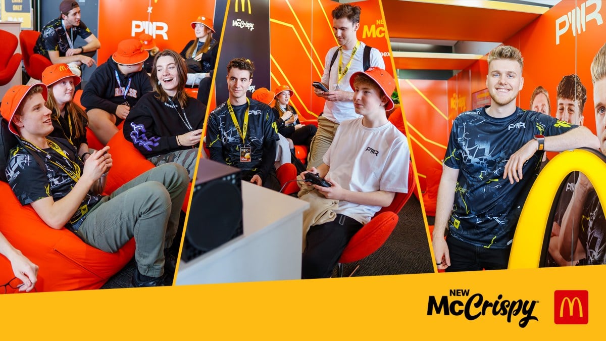 Several gamers play video games while surrounded by McDonald’s branding