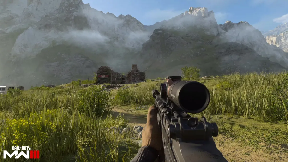 A first-person point of view of a player holding a marksman rifle while looking at an abandoned outpost in Call of Duty: Modern Warfare 3.