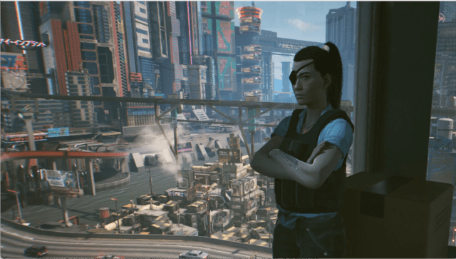 Regina Jones stands in front of the city in Cyberpunk 2077.