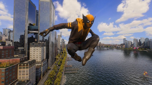 There is a shot of Miles Morales wearing a Wolverine inspired suit while swinging through the city.