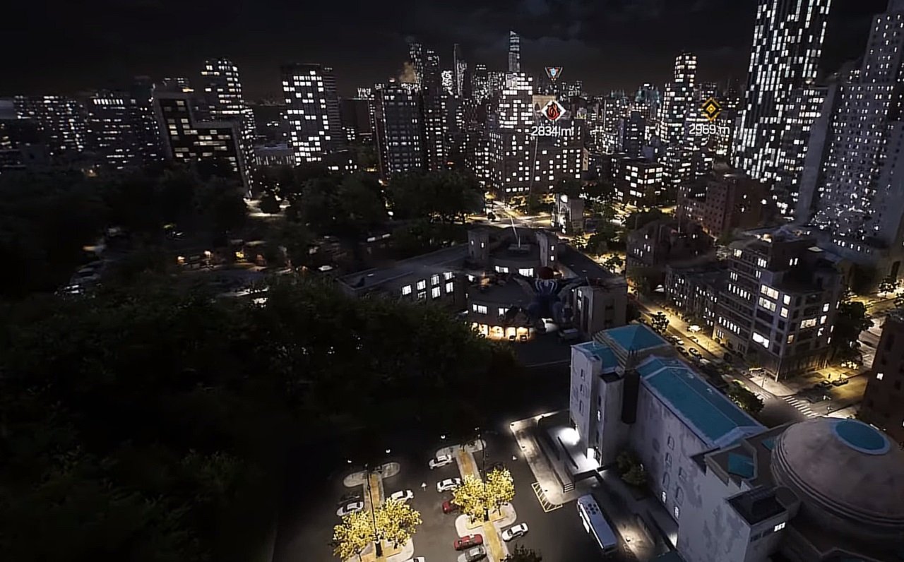 There is a shot of the city at night with Spider-Man gliding through the air.