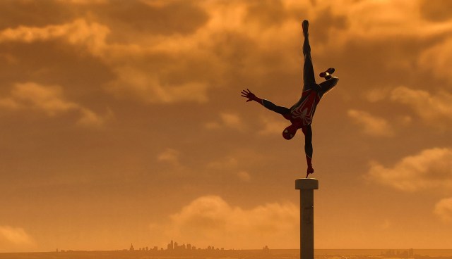There is a shot of Spider-Man doing a flip pose, with an orange sky behind him.