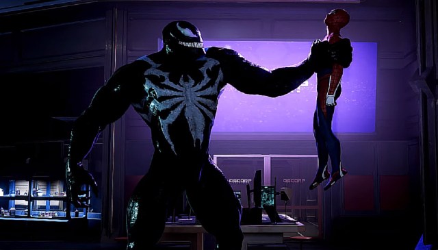THere is a shot of Venom picking up Spider-Man with one hand.