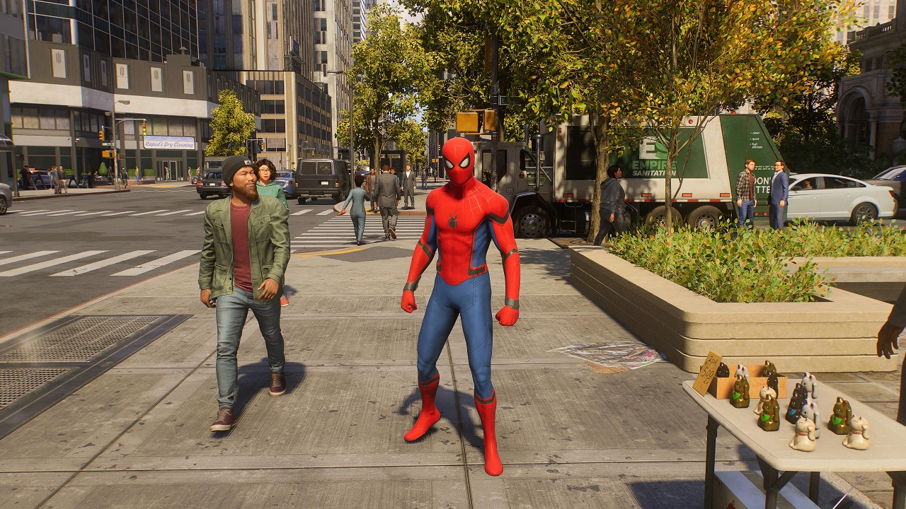 There is an image of Spider-Man walking through the New York City streets.