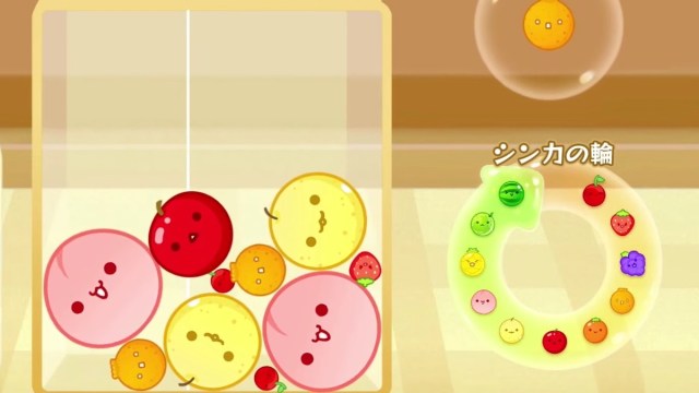 The Suika Game, with various colorful shapes.