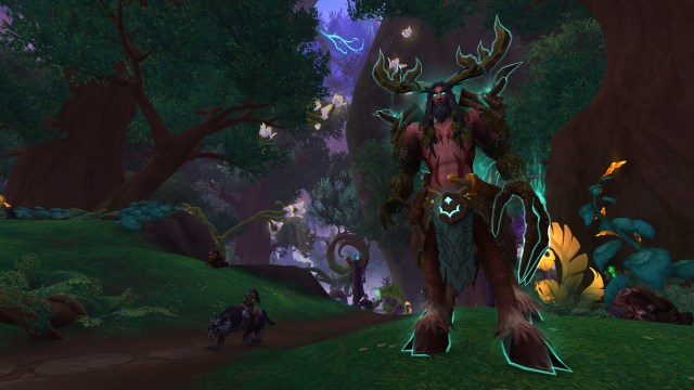 Druid character in the Emerald Dream -- Cenarius stands near Amirdrassil in WoW's newest patch