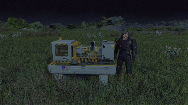 Image of a man standing next to a workbench at night in Starfield.