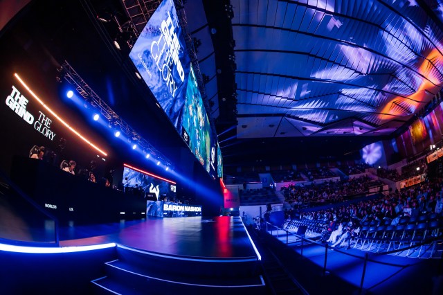 The stage at the 2023 League of Legends World Championship with blue lighting.