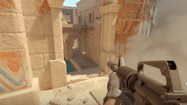M4A1-S on Anubis at mid shooting at an enemy in canals below middle