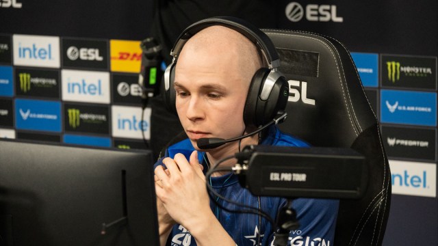 EliGE, a player for Complexity, sits at a desk at IEM Sydney.