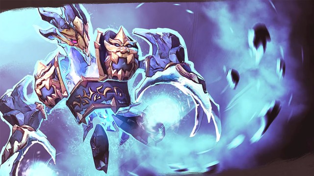 Ancient Apparition, from Dota 2, a ghoul-like entity forms an ice charge while wearing gold and blue armor.