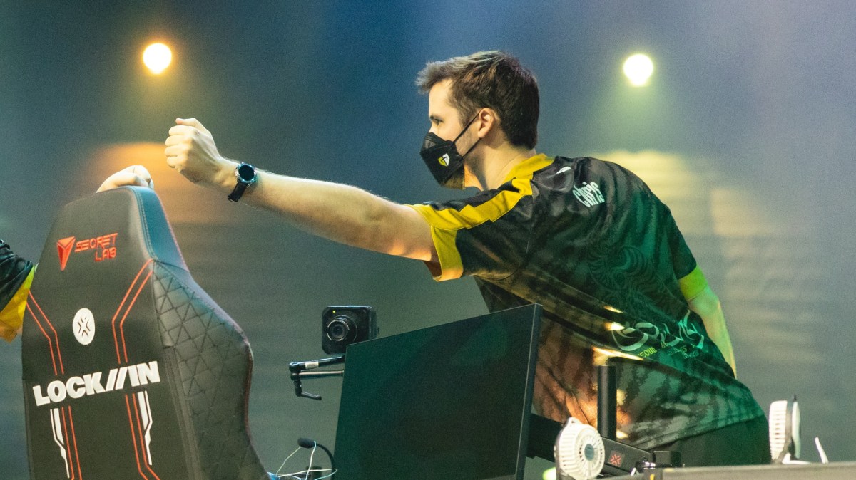 Kim "Secret" Ha-jin (L) and coach Chris "Elmapuddy" Tebbit of Gen.G Esports fist bump onstage at the VALORANT Champions Tour 2023: LOCK//IN Groups Stage on February 15, 2023 in Sao Paulo, Brazil.