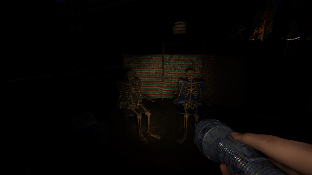 Two skeletons sitting together.