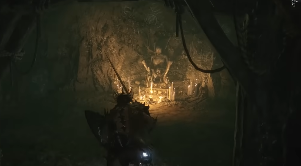 Main character looking at an altar.