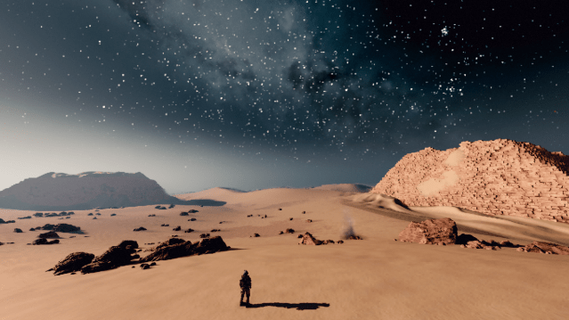 Starfield player stading in front of what's left of two pyramids on Earth.