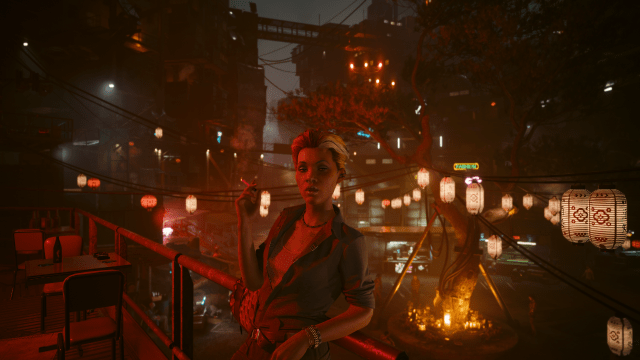 Alex, a character in Cyberpunk 2077 Phantom Liberty, smoking a cigarette in front of a memorial tree decorated by beautiful warm light lanterns.