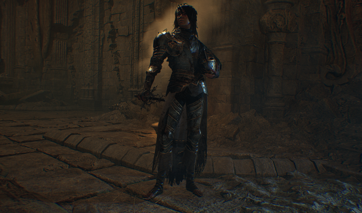 Pieta, in Lords of the Fallen. A woman with dark shoulder-length hair stands in metal armor