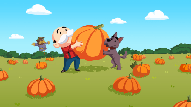 The Monopoly man moving a pumpkin with the help of a dog.