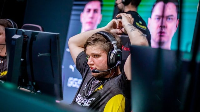 Photo taken of s1mple with his hands behind his back during a CS:GO match of PGL Antwerp Major 2022.