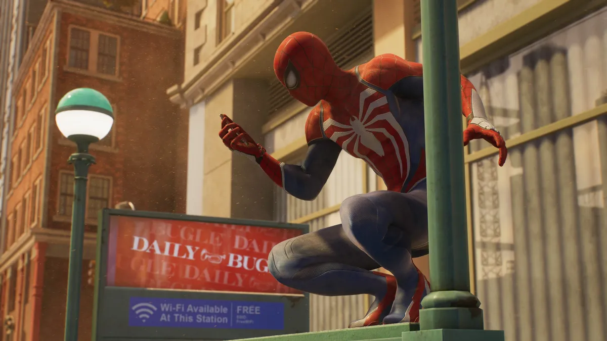 A screenshot of Peter Parker Spider-Man looking at his phone while perched on a railing.