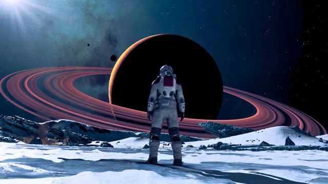 An astronaut staring at Saturn in space in Starfield