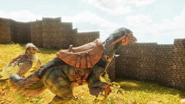 A tamed Therizinosaur stood in front of a tamed Argentavis in Ark: Survival Ascended.