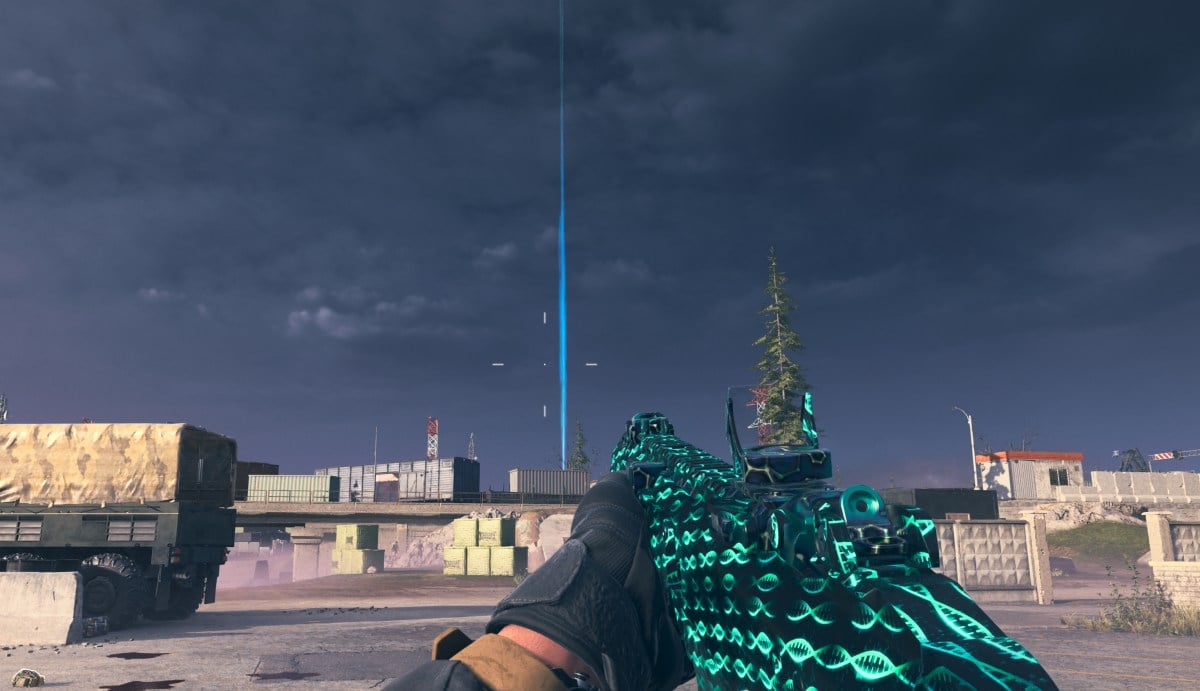 A blue light beaming into the sky showing the location of a Mystery Box.