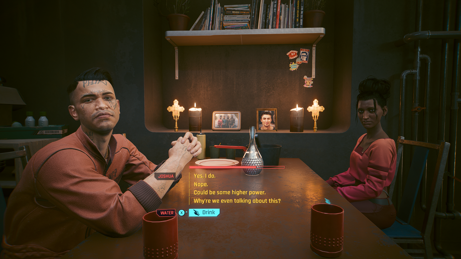 Joshua and Zuleika sitting at a dinner table in a home, with a religious memorial in view behind them (Cyberpunk 2077).