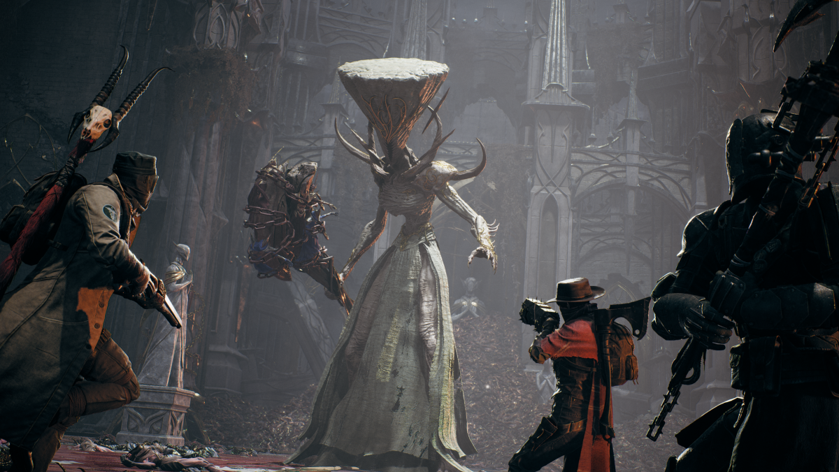 Three survivors facing down against a large, menacing boss in Remnant 2.