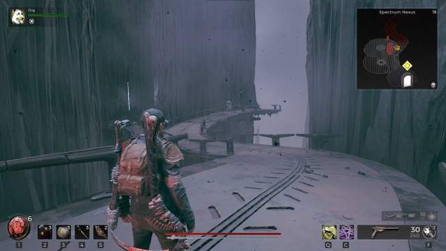 A player stands on a bridge in the mist in N'erud in Remnant 2.