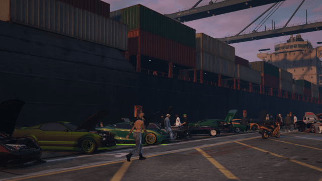 GTA 5 docks with fancy cars all lined along it, with plenty of colourful customizations.