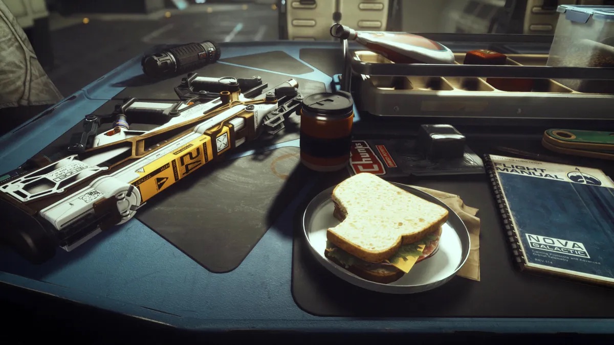 Various items as seen on a table in Starfield, including a sandwich.